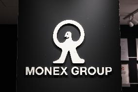 Monex Group's signage and logo